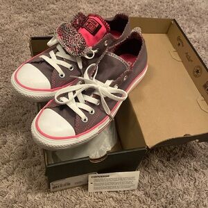 Women’s Converse Chuck Taylor Grey double tongue sneakers.